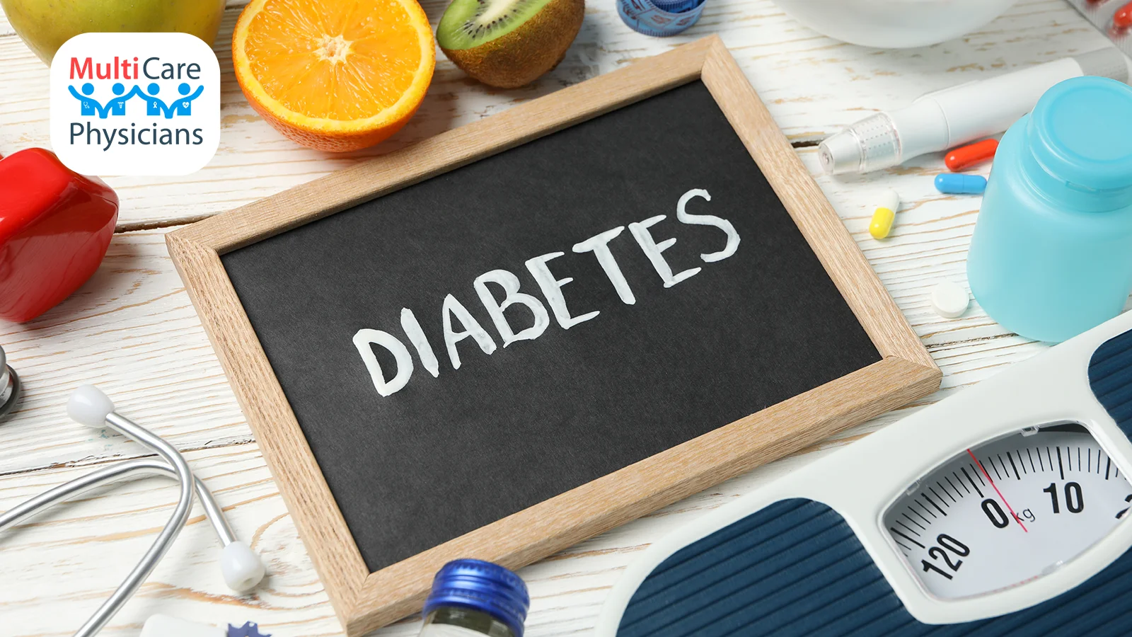 A chalkboard displaying the word 'Diabetes' surrounded by healthy fruits, pills, a stethoscope, and a scale. MultiCare Physicians advises on the best dietary choices and highlights food diabetics should avoid, such as processed sugars and high-carb snacks.